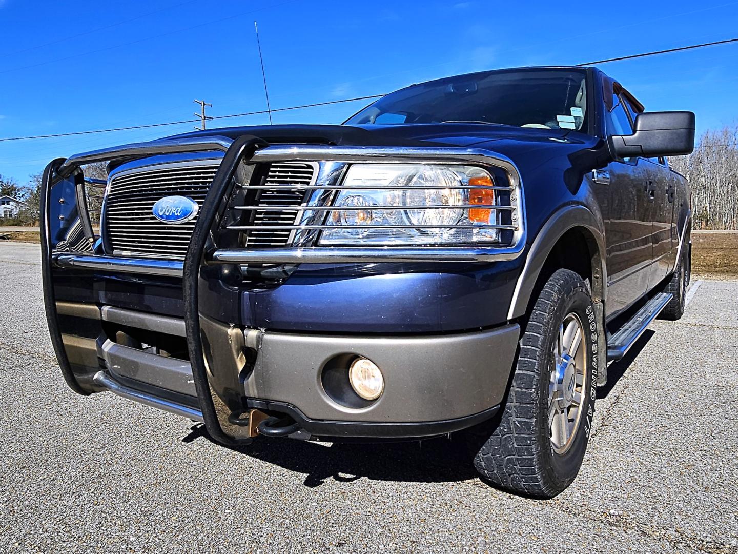 2006 Blue Ford F-150 Lariat SuperCrew (1FTPW14V86F) with an 5.4L V8 SOHC 24V FFV engine, 4-Speed Automatic Overdrive transmission, located at 18001 Kellogg Rd, Saucier, MS, 39574, (228) 832-1441, 39.421459, -76.641457 - Photo#22